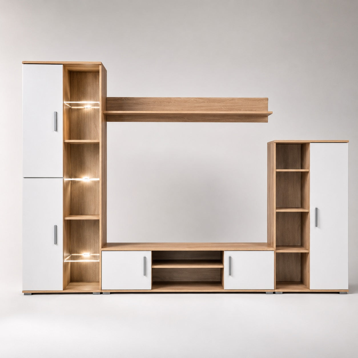 Meuble TV bibliothèque en bois blanc vue de face avec étagères éclairées et rangements spacieux