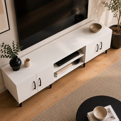 Vue plongeante d’un meuble TV moderne blanc avec rangements et espaces multimédias pratiques