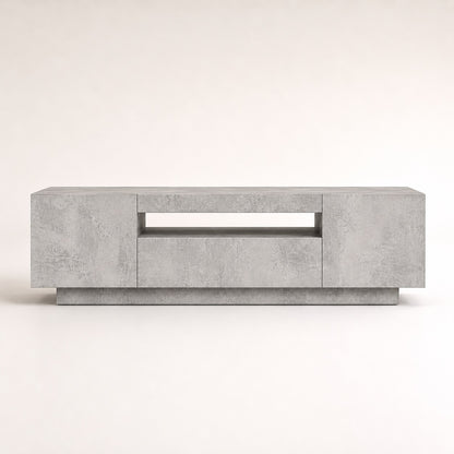 Meuble TV moderne gris avec rangement et LED intégrée, vue frontale au design minimaliste.